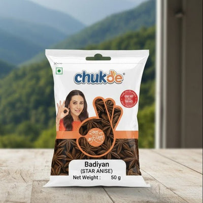 Chukde Badiyan star anise package on a wooden surface with a mountainous landscape in the background