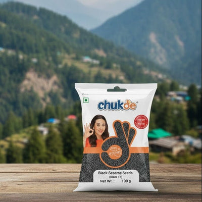 Chukde black sesame seeds packaging on a wooden surface with a mountainous background