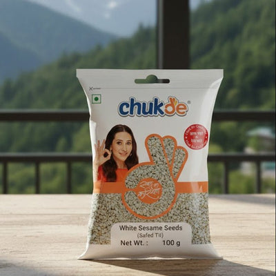 Bag of chukde white sesame seeds with a scenic mountain background