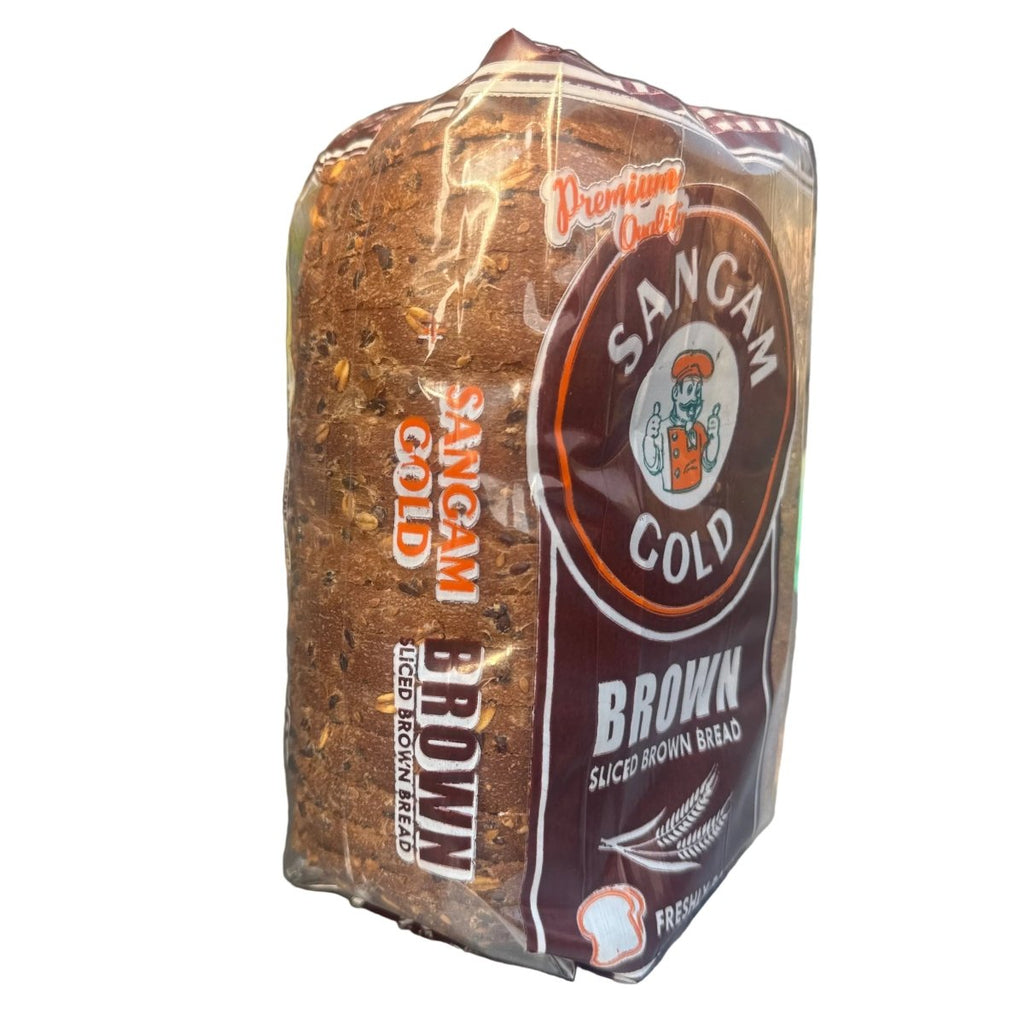 Packaged loaf of Sangan Brown bread on a metal surface