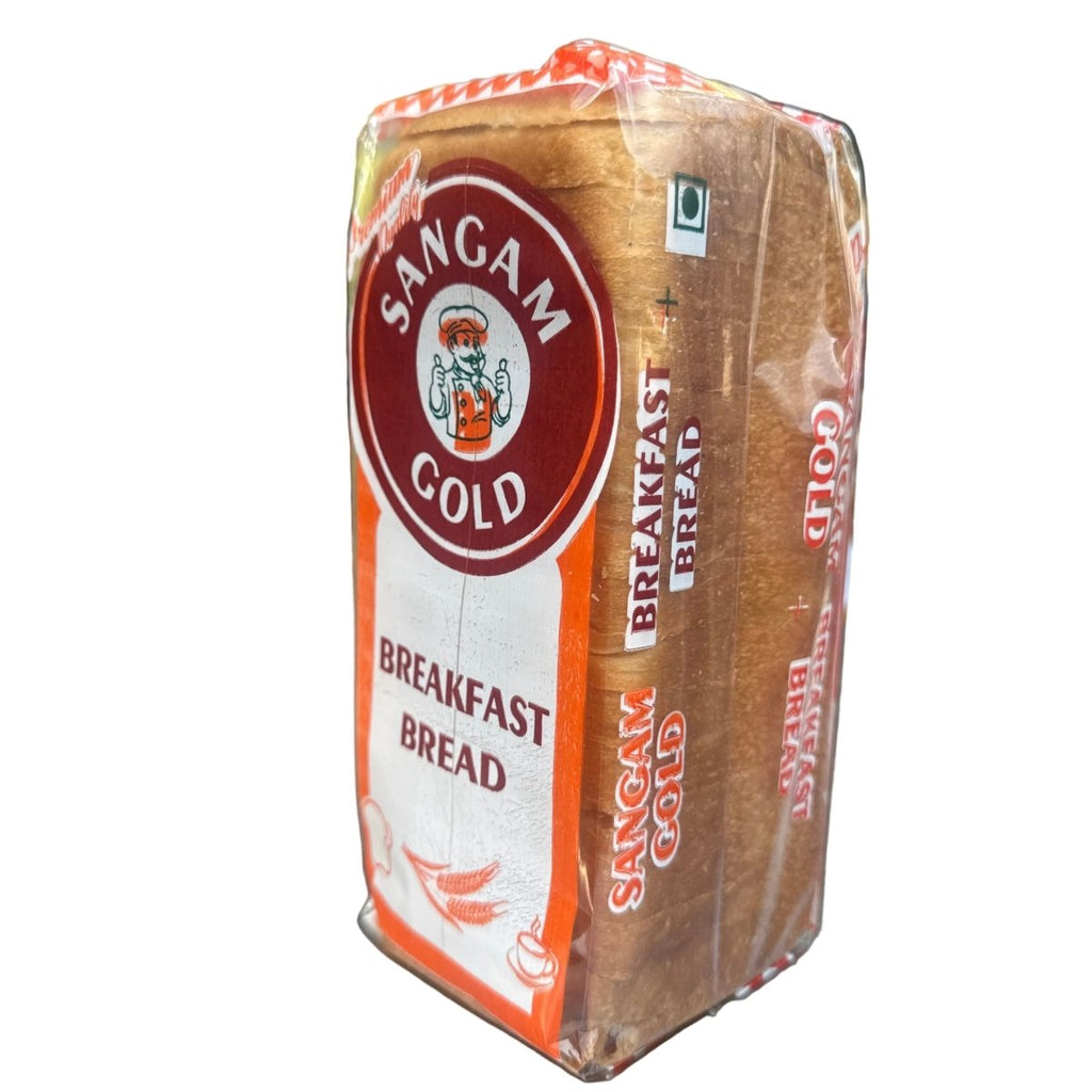 Packaged Sanam Gold Breakfast Bread on a metal surface with a blurred background