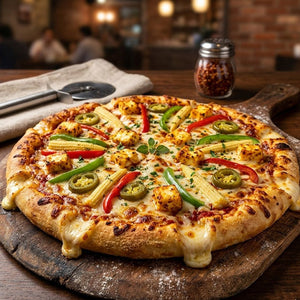 Delicious pizza with various toppings on a wooden board in a restaurant setting.