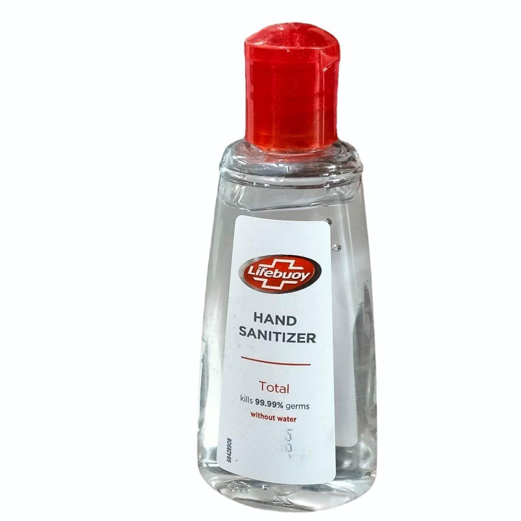 Hand sanitizer bottle with red cap on a white background