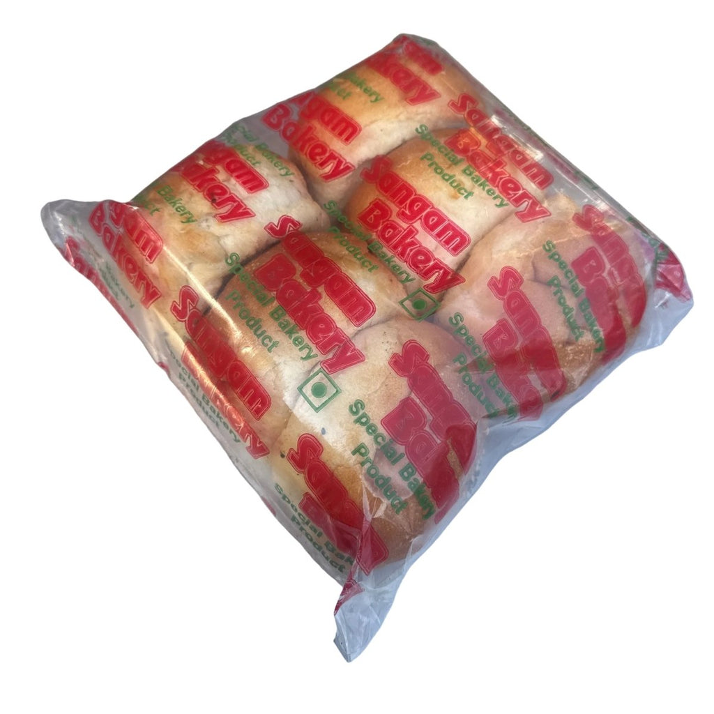 Packaged cookies with red and green packaging on a metallic surface