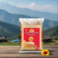 Aashirvaad rice package with a scenic mountain background