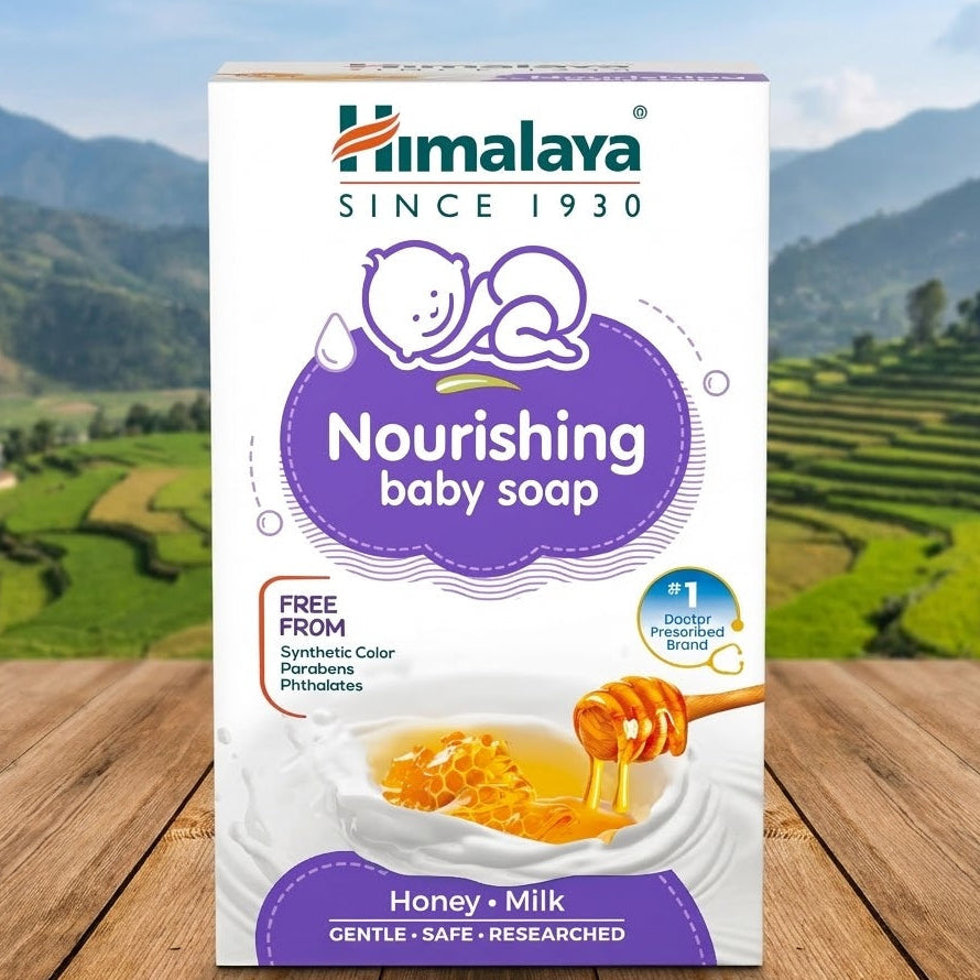 Himalaya Nourishing Baby Soap packaging with a scenic background
