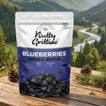 Nuttly Gritties blueberries packaging with a mountainous landscape in the background