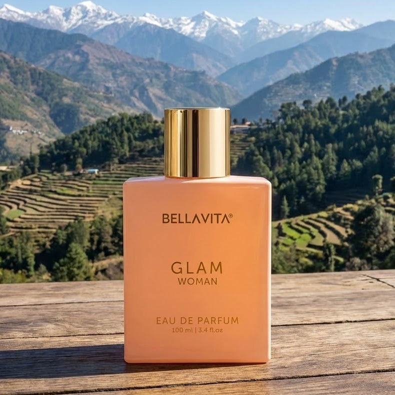 Bellavita Glam Woman perfume bottle with a mountainous landscape in the background