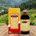 Hempushpa bottle and box with a scenic mountain background