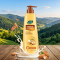 JOY Honey & Almonds body milk lotion with almonds and almond pieces on a wooden surface with a mountainous landscape in the background.