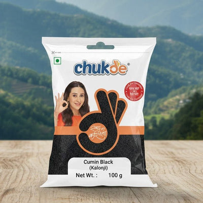 Chukde cumin black packaging with a scenic mountain background
