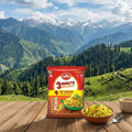 MTR 3 Minute Breakfast Poha package with a bowl of Poha on a wooden table with a mountainous landscape in the background