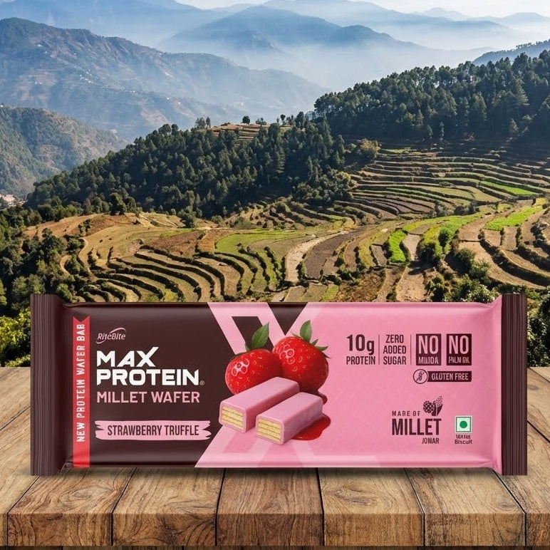 Max Protein Millet Wafer package with a scenic mountain landscape in the background