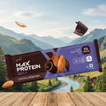 Max Protein Choco Almond Bar packaging with a mountainous landscape in the background