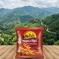 Packaging of McCain Masala Fries with a scenic mountain background