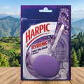 Harpic Hygienic Toilet Rim Block packaging with a scenic background