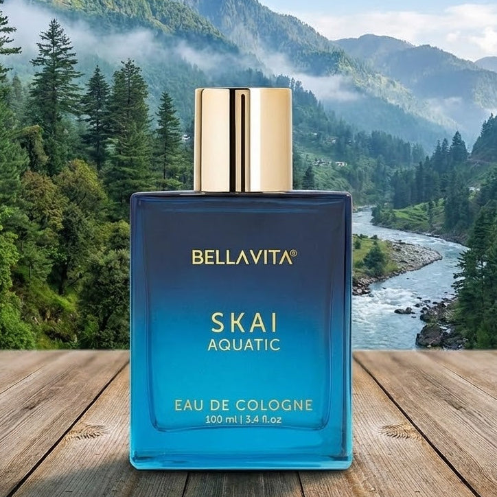 Bottle of Bellavita Skai Aquatic cologne with a scenic mountain backdrop