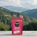 Tata Salt Himalayan Rock Salt package with a mountainous landscape in the background