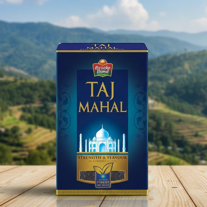 Taj Mahal tea box on a wooden surface with a scenic background