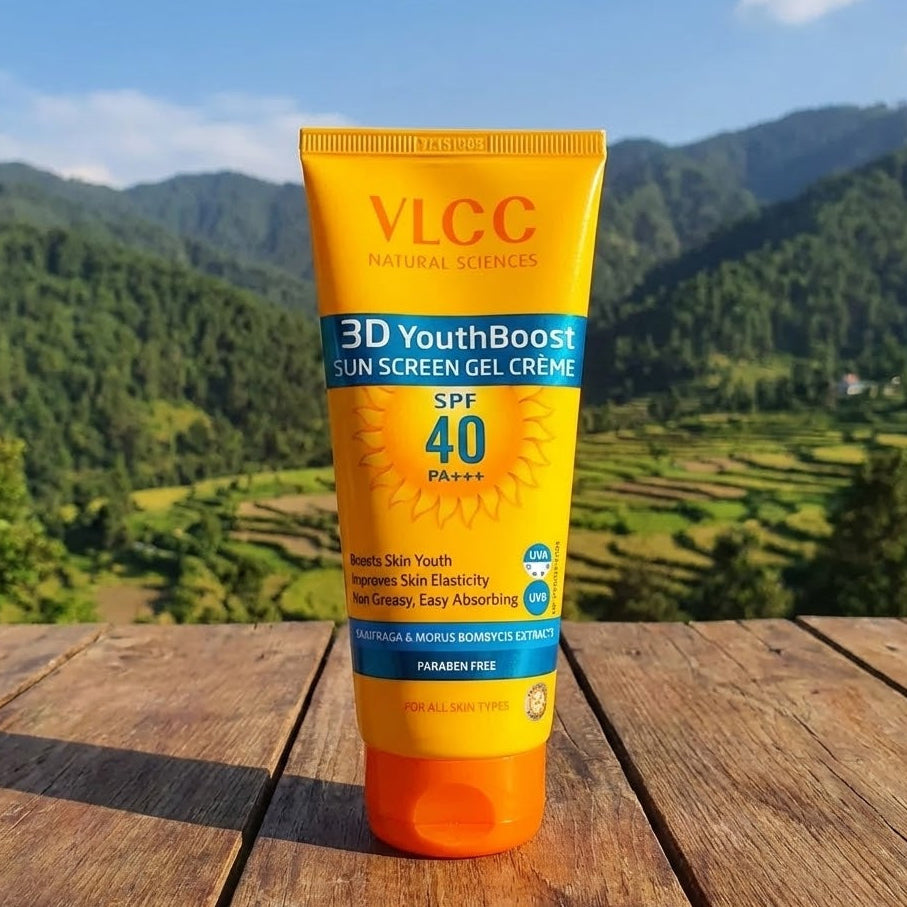 VLCC 3D YouthBoost sunscreen gel crème tube with a scenic background