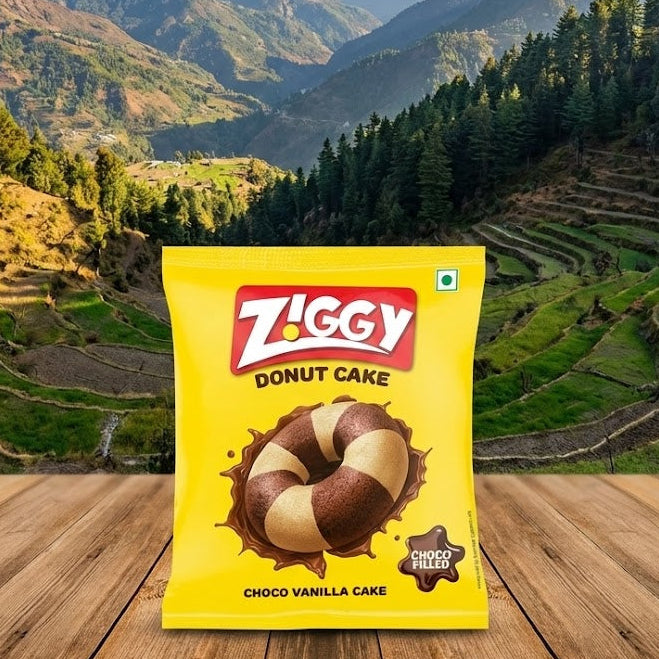 Ziggy Donut Cake package on a wooden surface with a mountainous landscape in the background