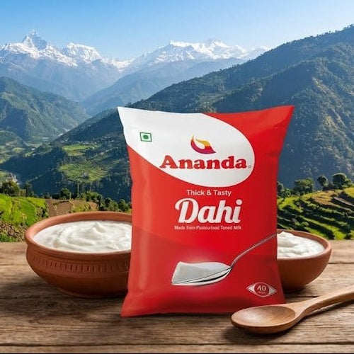 Ananda Dahi packet with a scenic background of mountains and terraced fields.