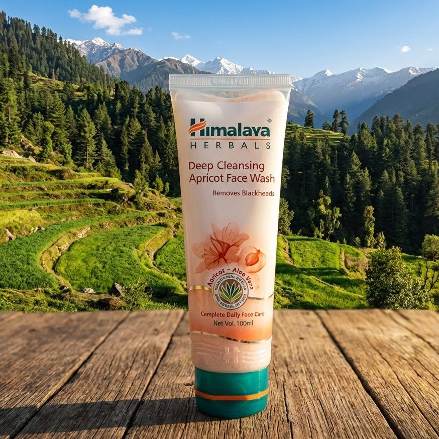 Himalaya Herbals Deep Cleansing Apricot Face Wash tube with a mountainous landscape in the background