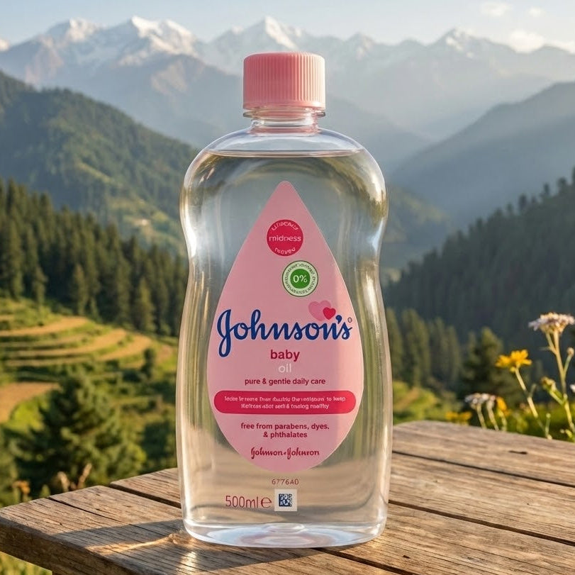 Bottle of Johnson's baby product on a wooden table with a mountainous landscape in the background