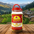 Jar of roasted vermicelli with a scenic mountain background