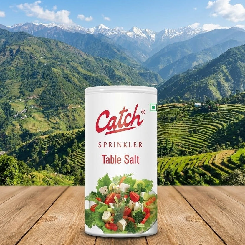 Can of Catch Table Salt with a scenic mountain background