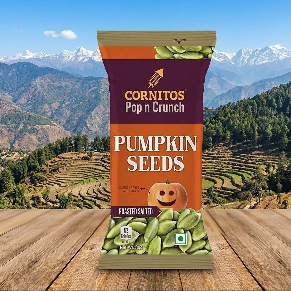 Cornitos Pop n Crunch Pumpkin Seeds package with a mountainous landscape in the background