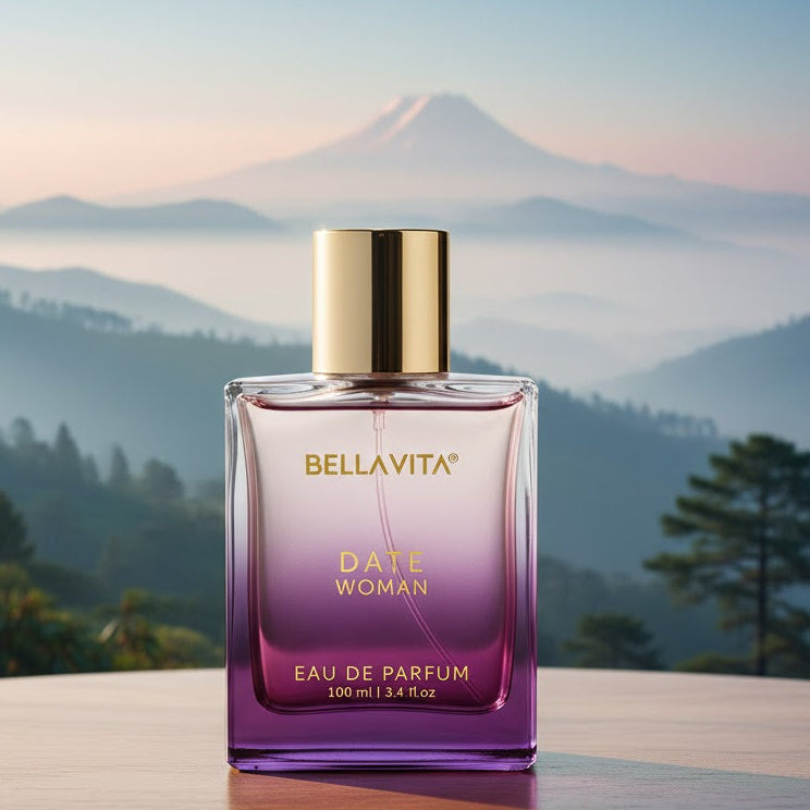 Bottle of Bellavita perfume with a mountainous landscape in the background
