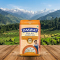 Daawat Pulav Basmati Rice package with a scenic background of mountains and fields.
