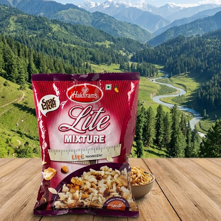 Haldiram's Lite Mixture packet with a scenic mountain view in the background
