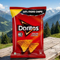 Doritos Nacho Cheese chips bag with mountainous landscape in the background
