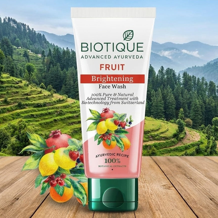 Biotique Fruit Brightening Face Wash tube with a scenic background