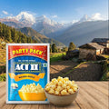 ACT II Golden Sizzle popcorn party pack with a bowl of popcorn in front of a mountainous landscape.
