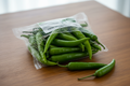 green chilly 250gm pack on the table