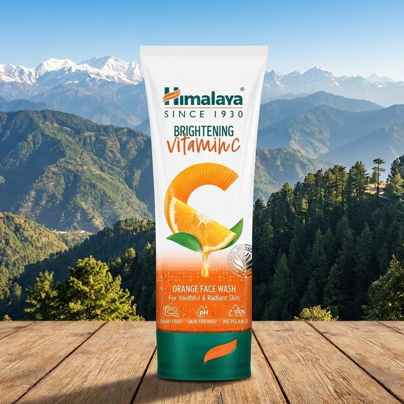 Himalaya Brightening Vitamin C face wash tube with mountainous landscape in the background