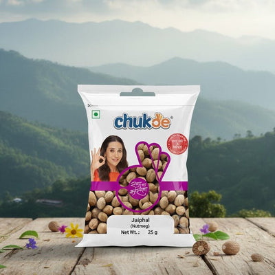 Chukde snack package on a wooden table with a mountainous landscape in the background