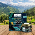 Kapiva Shilajit Gold Resin packaging with a scenic mountain background