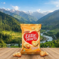Bag of Britannia Little Hearts Classic Crunch cookies with a scenic mountain backdrop