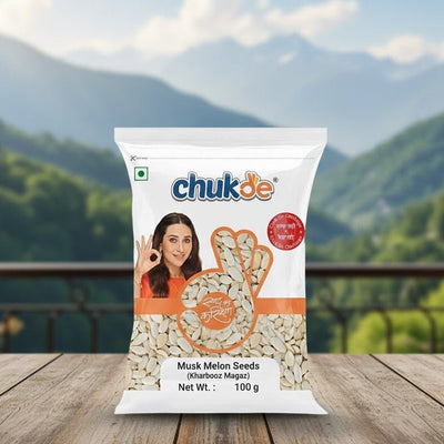 Bag of Chukde Musk Melon Seeds on a wooden surface with a mountainous background