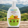 Mamaearth Vitamin C Body Lotion bottle with a scenic background of mountains and greenery.