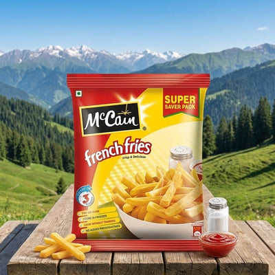 Bag of McCain French Fries on a wooden table with a scenic mountain background