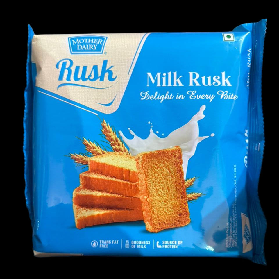 Milk Rusk packaging held in front of a blurred background