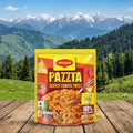 Maggi Paizza package on a wooden surface with a mountainous landscape in the background