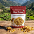 Natty Gritties Indian Long Raisins package with a scenic mountain background