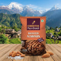 Cornitos Pop n Crunch roasted almonds package with a scenic mountain background
