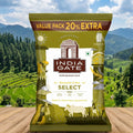 India Gate rice package with a scenic background of mountains and fields.